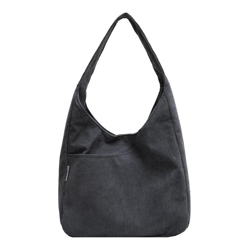 Sac à bandoulière tendance de grande capacité pour femme.